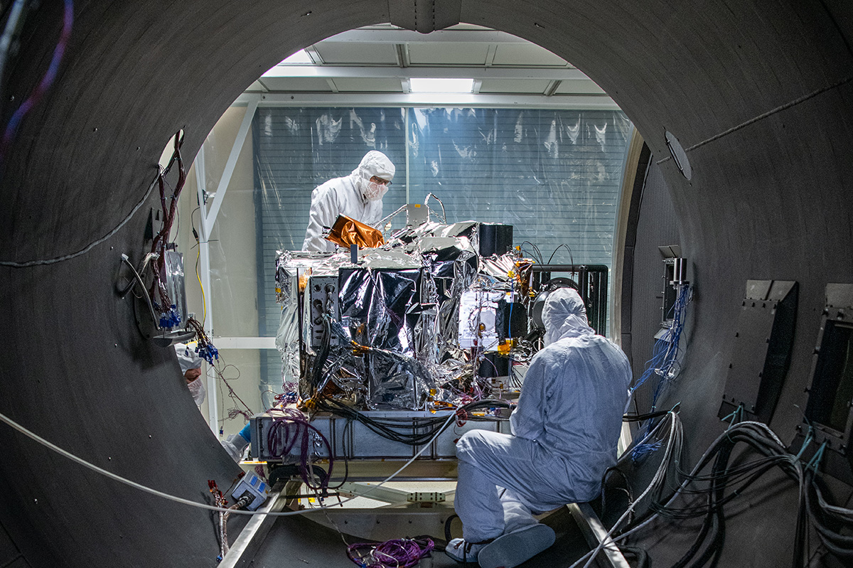PACE instrumentation being prepared for the thermal vacuum chamber at Goddard Space Flight Center.